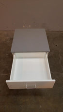 24" mobile laboratory cabinet with 3 drawers and resin countertop (pre-owned)