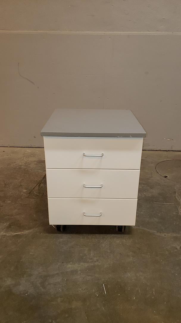 24" mobile laboratory cabinet with 3 drawers and resin countertop (pre-owned)