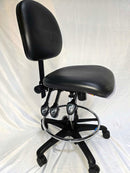 Rolling lab chair | Bench height with vinyl seat and back, 3 lever adjustment, and nylon footring -- adjustable height (21" to 31") (Pre-owned)