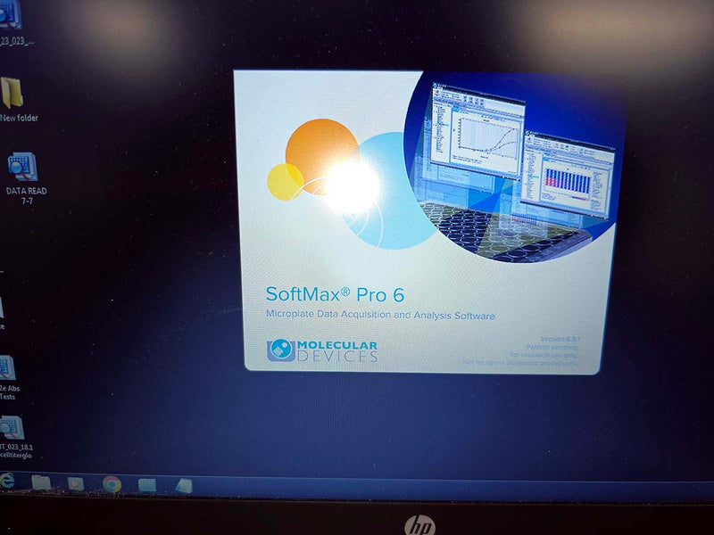 Molecular Devices SpectraMax M2e Multi-Mode microplate reader package with laptop computer, software, and warranty